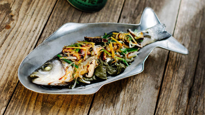 Gedämpfter Fisch mit Teeblättern