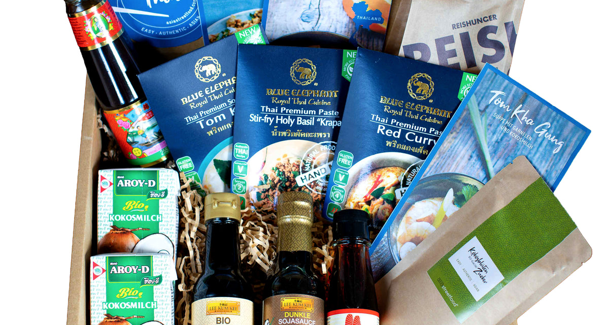 Tom Kha, Pad Kra Pao und rotes Curry in einer Box