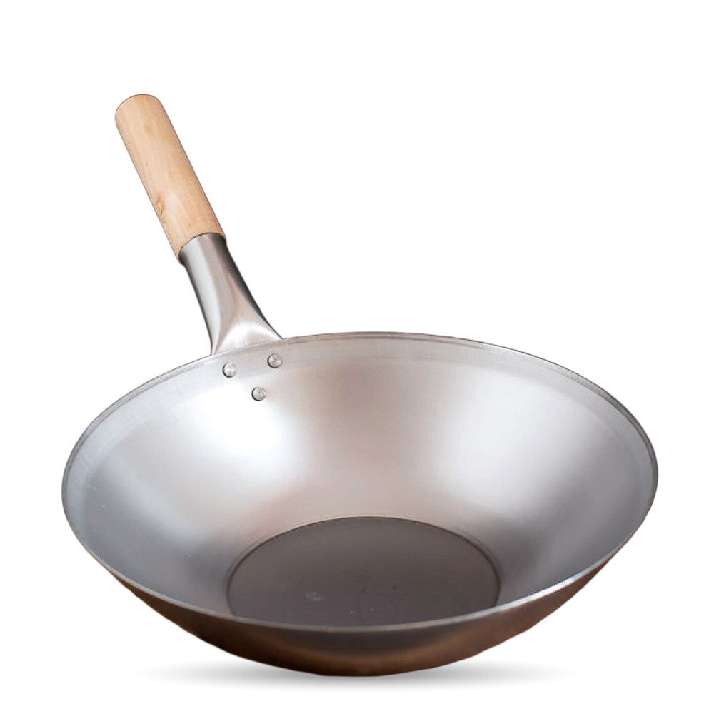 Wok de acero al carbono nuevo con fondo plano y mango de madera